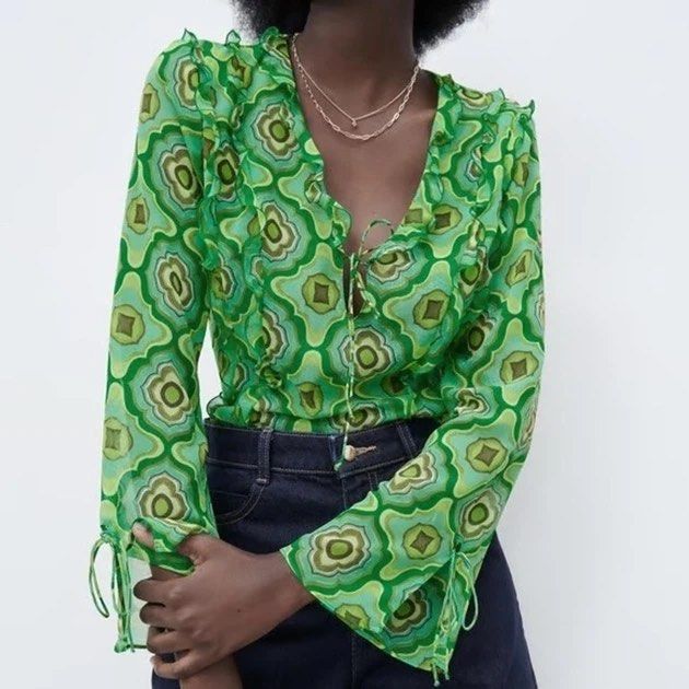 ZARA - retro geometric print sheer blouse (Category: Longsleeves) located in Cebu City. Submitted by bnta.bnta (Listing ID 1465845806, Image 2). Description: green retro geometric print sheer blouse with ruffles and a tie neckline .