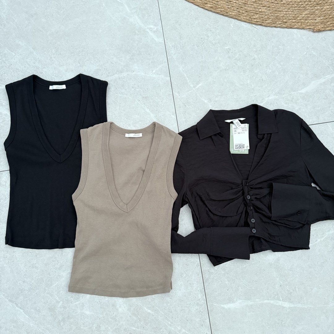 Zara basic (Category: Blouses) located in Singapore. Submitted by yesstillavailableforyou (Listing ID 1465830922, Image 1). Description: Zara each $8 Just washed not worn Can see that the shape is there H&M bnwt $8 All sold separately .