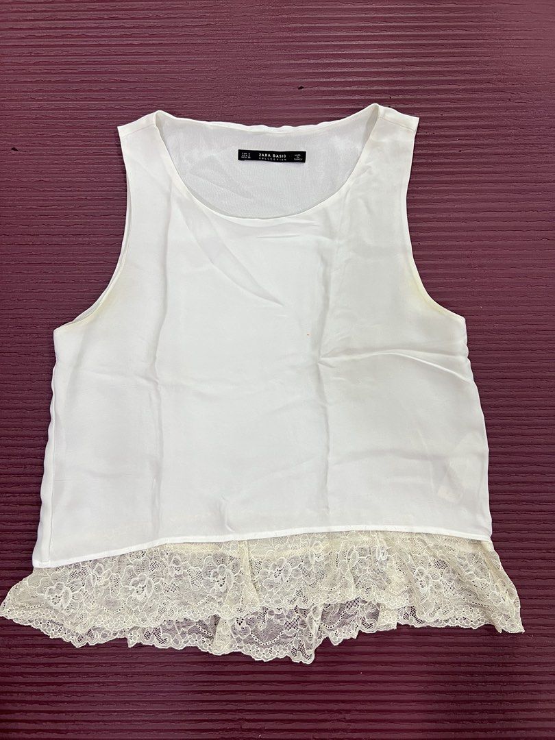 Zara Basic Sleeveless White Top with Lace Hem (Category: Sleeveless) located in Manila. Submitted by imprincessg888 (Listing ID 1465845869, Image 1). Description: - Brand: Zara Basic - Size: EUR S / USA S / MEX 26 - Color: White with cream lace trim - Material: Lightweight fabric - Condition: Clean, excellent, ready to wear - Details: Scoop neckline, stylish lace hem - Styling: Great with jeans or skirts for warm weather.