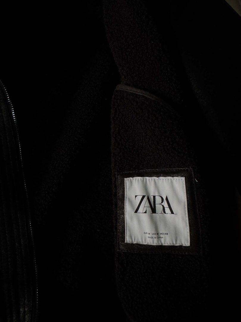 ZARA Black Faux Shearling Aviator Jacket (Category: Coats, Jackets and Outerwear) located in Manila. Submitted by seangoart (Listing ID 1465784759, Image 2). Description: - Brand: Zara - Style: Aviator jacket with wide lapel collar - Size: EUR M / USA M / MEX 40 - Color: Black - Material/Lining: Thick faux shearling lining (keeps you very warm in cold weather) - Closure & Pockets: Heavy-duty front zip closure with side welt pockets - Details: Dou