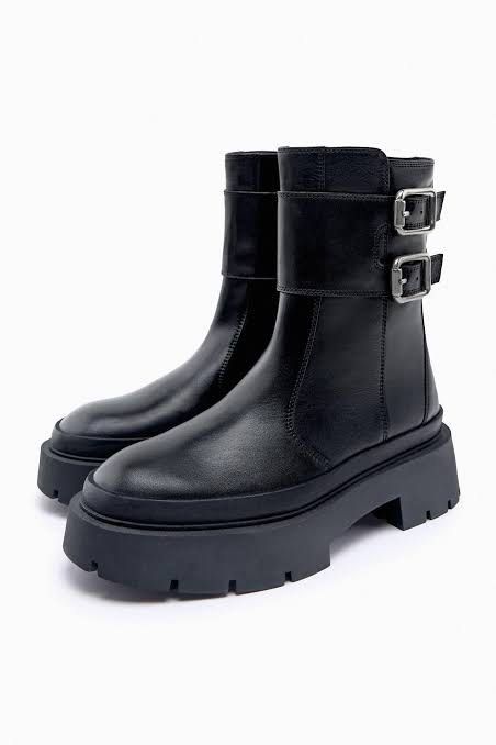 Zara Black real Leather Buckle Platform Boots (Category: Boots) located in Quezon City. Submitted by dropdeadprices (Listing ID 1465871691, Image 2). Description: - Brand/Model: Zara black leather platform boots - Size: EU 38 - Features: Double buckle ankle straps, chunky lug sole, and convenient side zipper closure - Condition: Pre-owned with normal leather creasing and minor scuffing on the soles - Perfect for adding an edgy vibe to any fall or