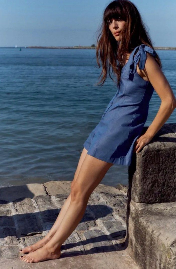 ZARA Bow strap Romper (Category: Rompers) located in Davao. Submitted by krau_ (Listing ID 1465852377, Image 2). Description: Washed, never used! XS on tag. Functional buttons, self-tie straps Denim look only. This is 100% cotton material .