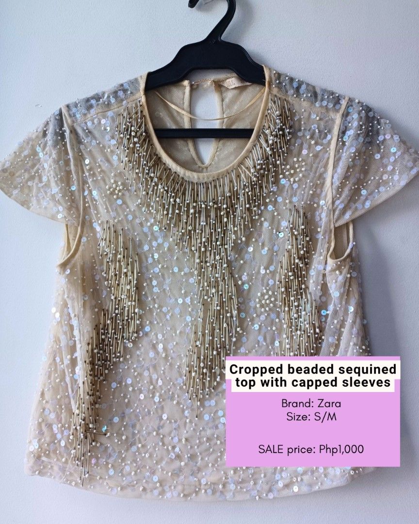Zara Cropped Beaded Sequined Top with Capped Sleeves (Category: Blouses) located in Makati City. Submitted by freegem.c6de30 (Listing ID 1465836698, Image 1). Description: - Brand: Zara - Size: S - Design: Cropped top with front beads, sequins, and fringe details - Fabric: Sheer mesh background with capped sleeves - Closure: Keyhole button closure at the back neck - Condition/Deal: Great statement piece for parties, available at a special sale pr