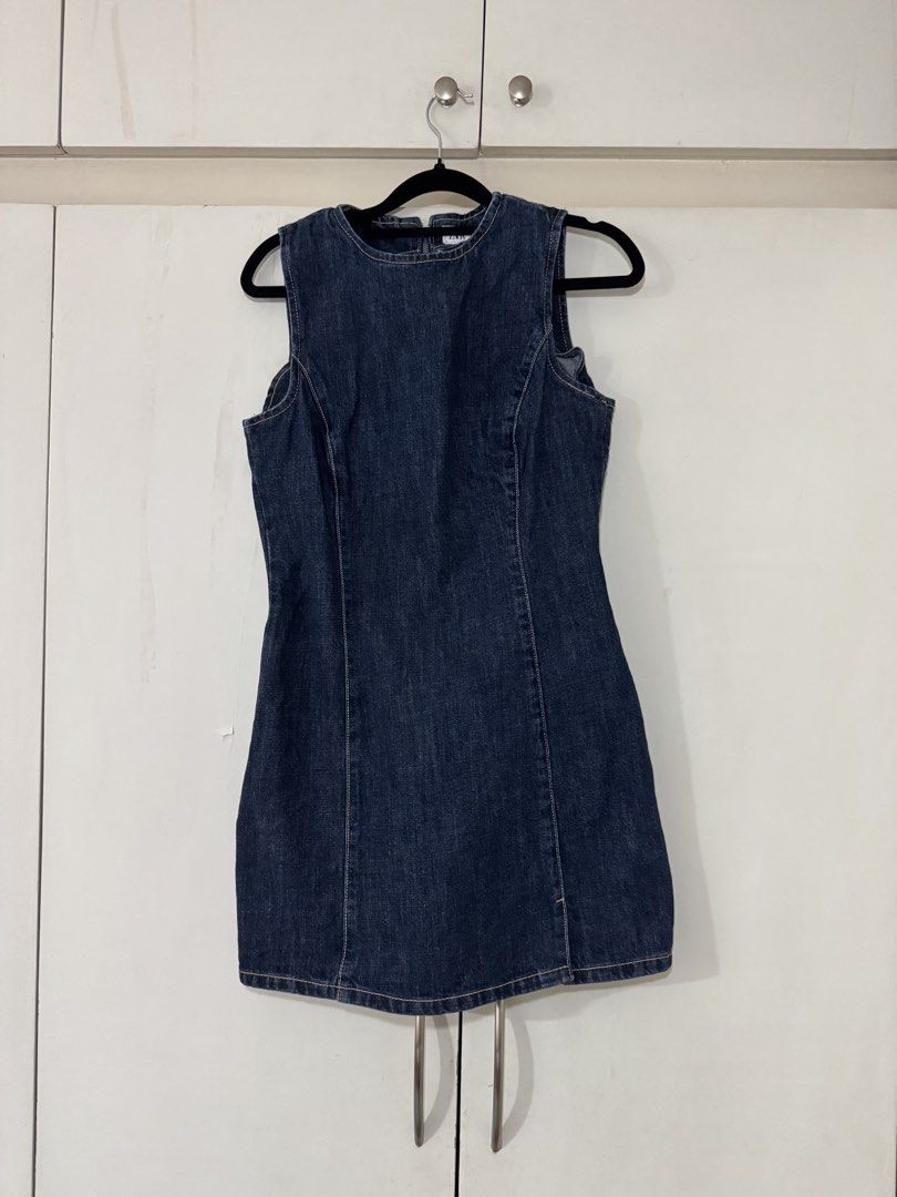 Zara denim mini dress size M (Category: Dresses) located in Manila. Submitted by chescapades (Listing ID 1465787417, Image 1). Description: - Brand: Zara - Color: Dark blue denim wash - Size: EUR M / USA M / MEX 28 - Style: Sleeveless with round neckline and structured front seams - Closure: Back zipper for easy wear - Origin: Made in Pakistan - Condition: Excellent.