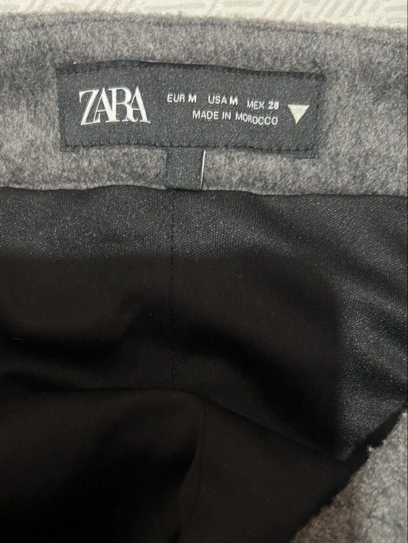 Zara Grey Wool Tube Top Size M (Category: Sleeveless) located in Manila. Submitted by kaceylgt (Listing ID 1465922788, Image 3). Description: - Brand: Zara - Size: M (Made in Morocco) - Material: Grey wool-blend, fully lined inside in black - Details: Cute black bow at the front neckline - Closure: Convenient side zipper - Condition: Clean inside and out, smoke-free home.