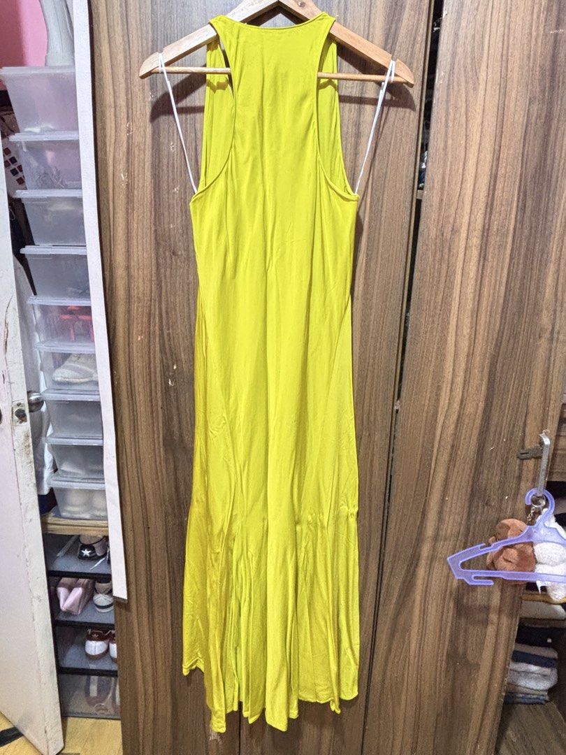 Zara Lime Yellow Maxi Dress (Category: Dresses) located in Manila. Submitted by margie_01 (Listing ID 1465797751, Image 2). Description: - Brand: Zara - Color: Bright lime yellow - Style: Racerback top with a flowing maxi skirt, easy slip-on - Fabric: Lightweight and breathable, perfect for warm weather - Features: Hanging straps attached at the shoulders - Condition: Excellent / Like new - Mode of Payment: GCash or Bank Transfer - Shipping: Via 