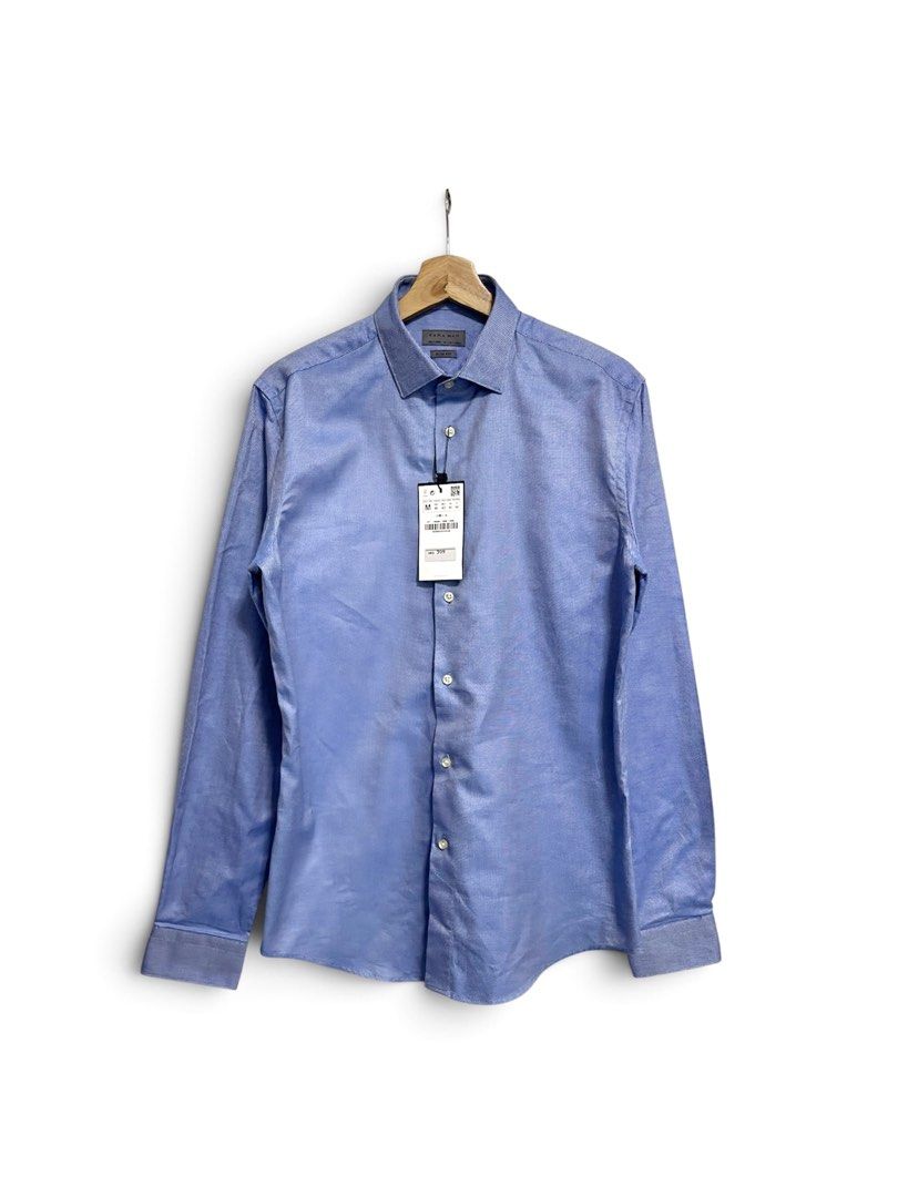 Zara Man Periwinkle Blue Longsleeve - Medium (Category: Formal Shirts) located in Bacoor. Submitted by Dakilang_Basurero (Listing ID 1465945019, Image 1). Description: Brand new with tags priced at 399HKD (around 3k). Medium on tag 20.5x29 No issue Perfect pang date, pang inside shirt sa blazer, pang corporate, pang porma, the color is too versatile. Loc: Bacoor,Cavite .