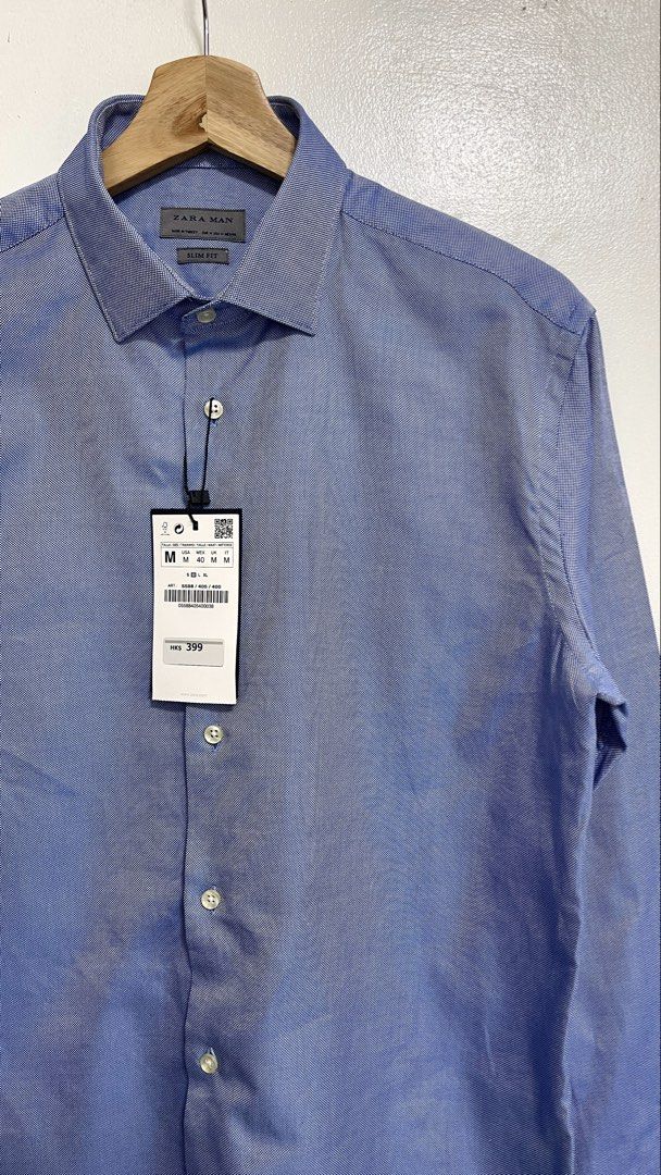 Zara Man Periwinkle Blue Longsleeve - Medium (Category: Formal Shirts) located in Bacoor. Submitted by Dakilang_Basurero (Listing ID 1465945019, Image 2). Description: Brand new with tags priced at 399HKD (around 3k). Medium on tag 20.5x29 No issue Perfect pang date, pang inside shirt sa blazer, pang corporate, pang porma, the color is too versatile. Loc: Bacoor,Cavite .