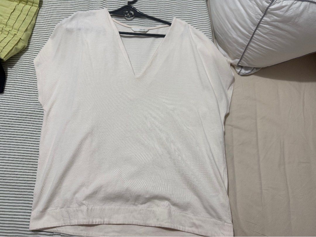 Zara VNeck shirt (Category: Shirts) located in Manila. Submitted by mcl014. (Listing ID 1465925623, Image 1). Description: Used once only.