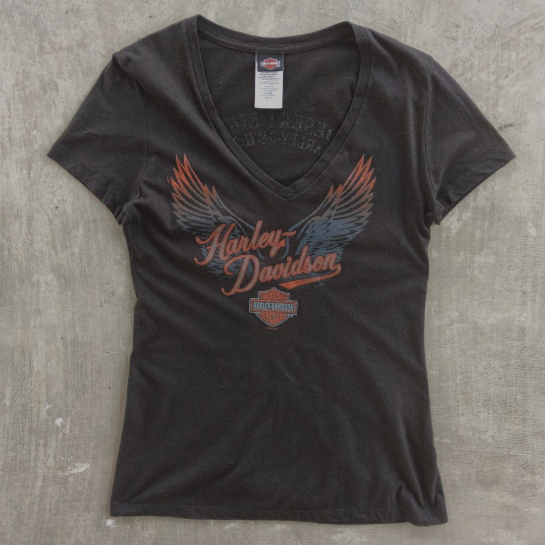2000's harley davidsons womens wings punk tee (Category: Shirts) located in Manila. Submitted by leighdizon22 (Listing ID 1466023341, Image 1). Description: width: 16.5 length: 25.5 no issue , authentic vintage color may vary due to lightning.