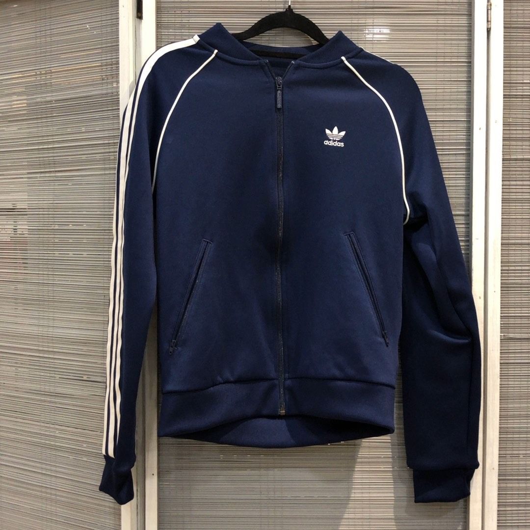 267009642 ADIDAS CLOTHES JACKET (Category: Coats, Jackets and Outerwear) located in Taguig. Submitted by ecoring.ph (Listing ID 1465975001, Image 1). Description: ◆CONDITION: B ◆DESCRIPTIONS: (Other defects/info:) The body of the jacket has minimal stains and dirt, and shows signs of use. * SIZE: ◆SHOULDER TO SHOULDER: 19inches. (approximately only) ◆BUST: 41inches. (approximately only) ◆ LENGTH: 22.5inches. (approximately only) ◆INCLUSIONS: NONE