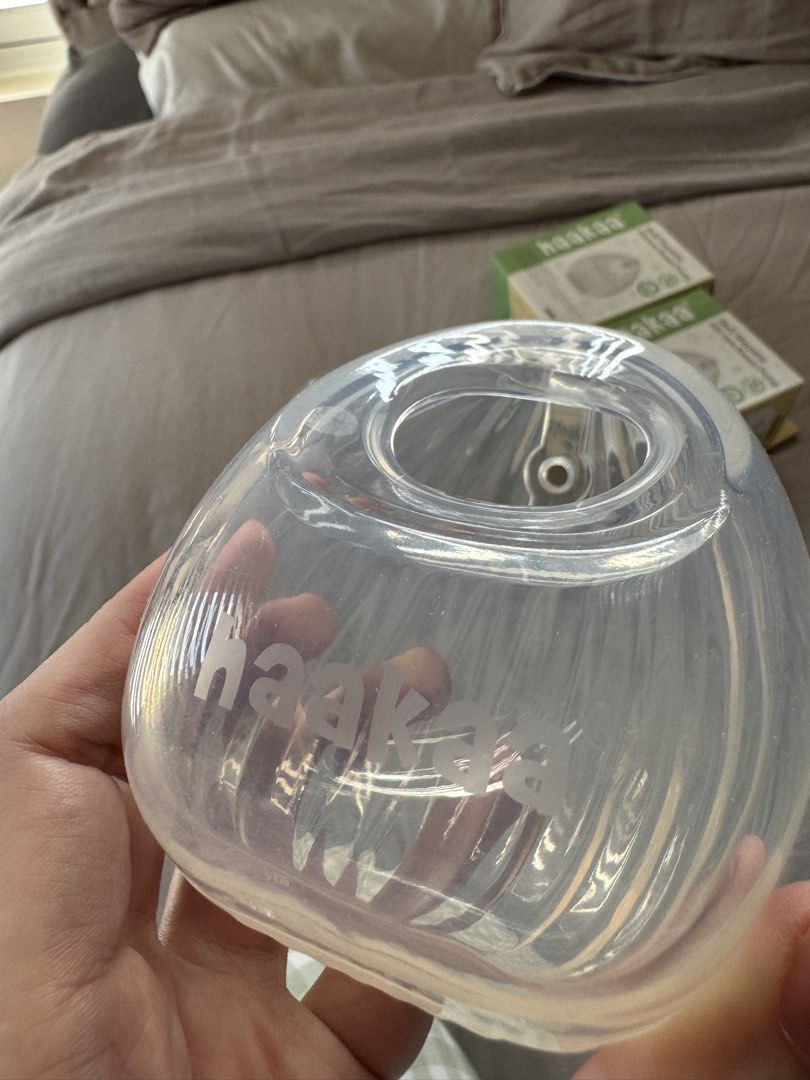 2 pcs Haakaa Shell Wearable Silicone Breast Pump 75ml (Category: Breastfeeding & Bottle Feeding) located in Dagupan City. Submitted by _carabels_ (Listing ID 1465957227, Image 3). Description: Authentic Haakaa wearable silicone breast shells/pumps (Set of 2) - Capacity: 2.5 oz / 75 ml each - 100% medical-grade silicone, BPA-free and non-toxic - Wearable and discreet design for hands-free milk collection - Includes original boxes and packaging Rfs