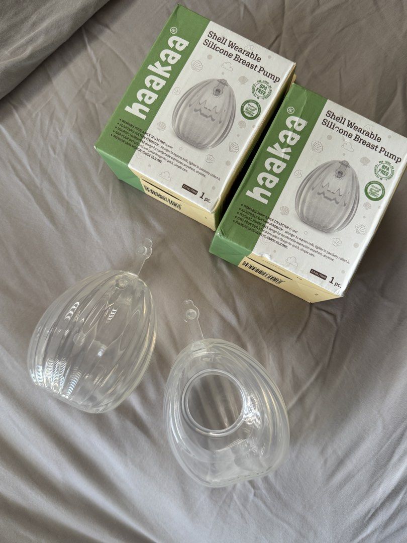 2 pcs Haakaa Shell Wearable Silicone Breast Pump 75ml (Category: Breastfeeding & Bottle Feeding) located in Dagupan City. Submitted by _carabels_ (Listing ID 1465957227, Image 1). Description: Authentic Haakaa wearable silicone breast shells/pumps (Set of 2) - Capacity: 2.5 oz / 75 ml each - 100% medical-grade silicone, BPA-free and non-toxic - Wearable and discreet design for hands-free milk collection - Includes original boxes and packaging Rfs