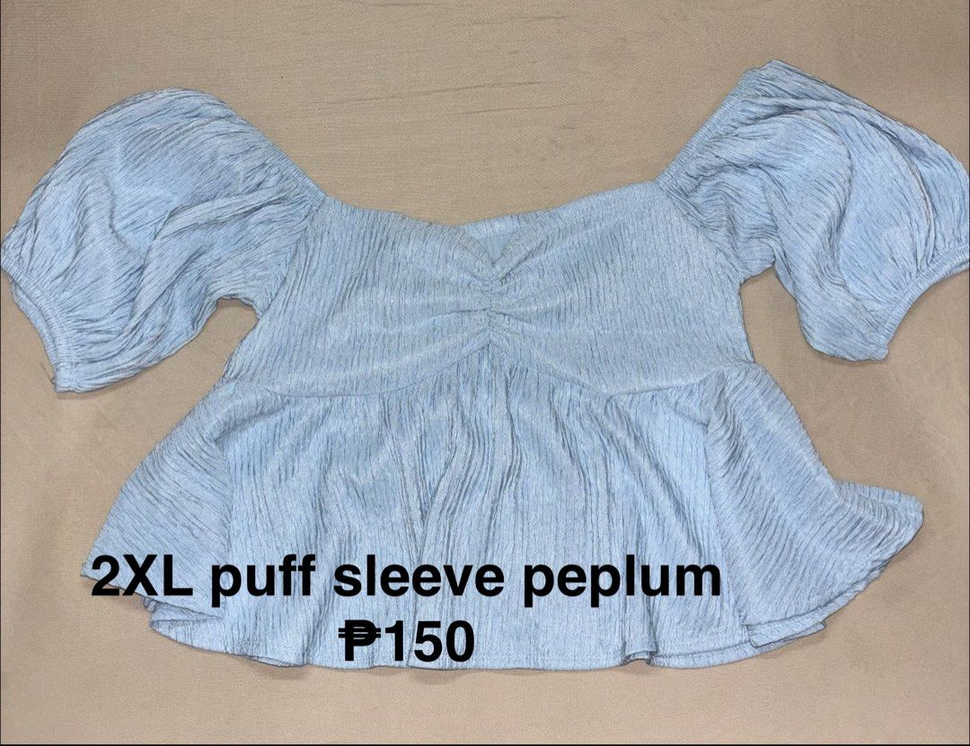 2XL Puff Sleeve Peplum Top Light Blue (Category: Blouses) located in Talisay. Submitted by clarelaureano (Listing ID 1466065499, Image 1). Description: - Size: 2XL - Color: Light blue - Design: Sweetheart neckline with ruched front and bodice - Sleeves: Short puffy sleeves - Fit: Flowy flared peplum hem - Material: Soft textured fabric - Ideal for: Casual daily wear or weekend outings 💖 Never been used 💖 Will give discount if buying 2 or more c