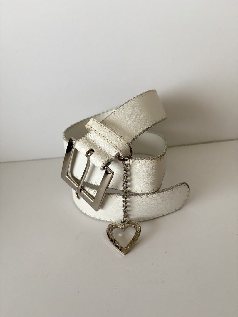 3. White Leather Belt w/ heart chain (Category: Belts) located in Quezon City. Submitted by wagwagan_ukay_blues (Listing ID 1466026031, Image 3). Description: From Japan In good used condition Please expect signs of usage hole Size -21”-26” Overall -30” Width -1.2” Novaliches Qc.