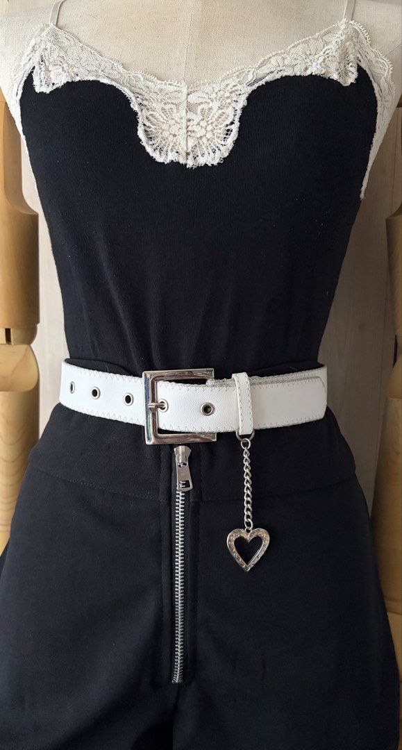 3. White Leather Belt w/ heart chain (Category: Belts) located in Quezon City. Submitted by wagwagan_ukay_blues (Listing ID 1466026031, Image 1). Description: From Japan In good used condition Please expect signs of usage hole Size -21”-26” Overall -30” Width -1.2” Novaliches Qc.