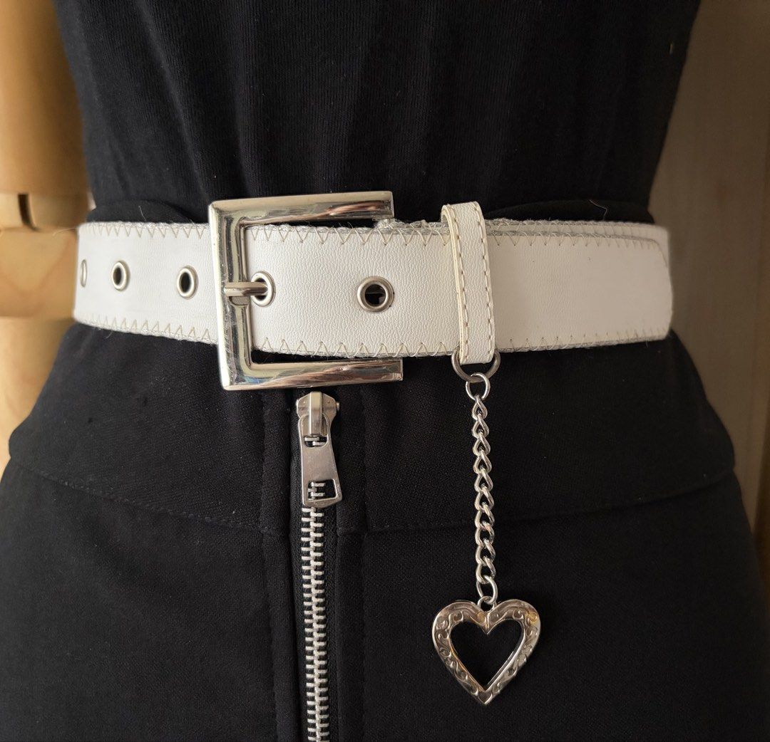 3. White Leather Belt w/ heart chain (Category: Belts) located in Quezon City. Submitted by wagwagan_ukay_blues (Listing ID 1466026031, Image 2). Description: From Japan In good used condition Please expect signs of usage hole Size -21”-26” Overall -30” Width -1.2” Novaliches Qc.