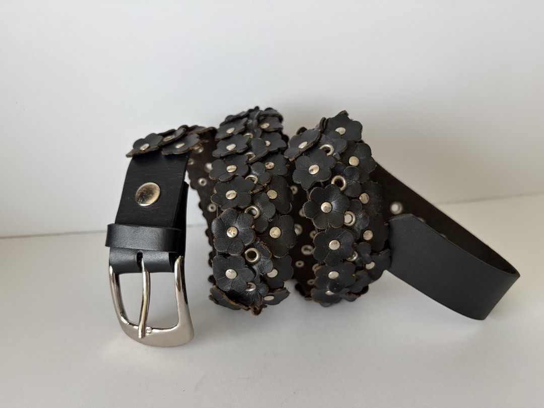 5. Black Flower Leather Belt (Category: Belts) located in Quezon City. Submitted by wagwagan_ukay_blues (Listing ID 1466027846, Image 3). Description: From Japan In good used condition Please expect signs of usage hole Size -up to 32” Overall -36” Width -1.1” Novaliches Qc.