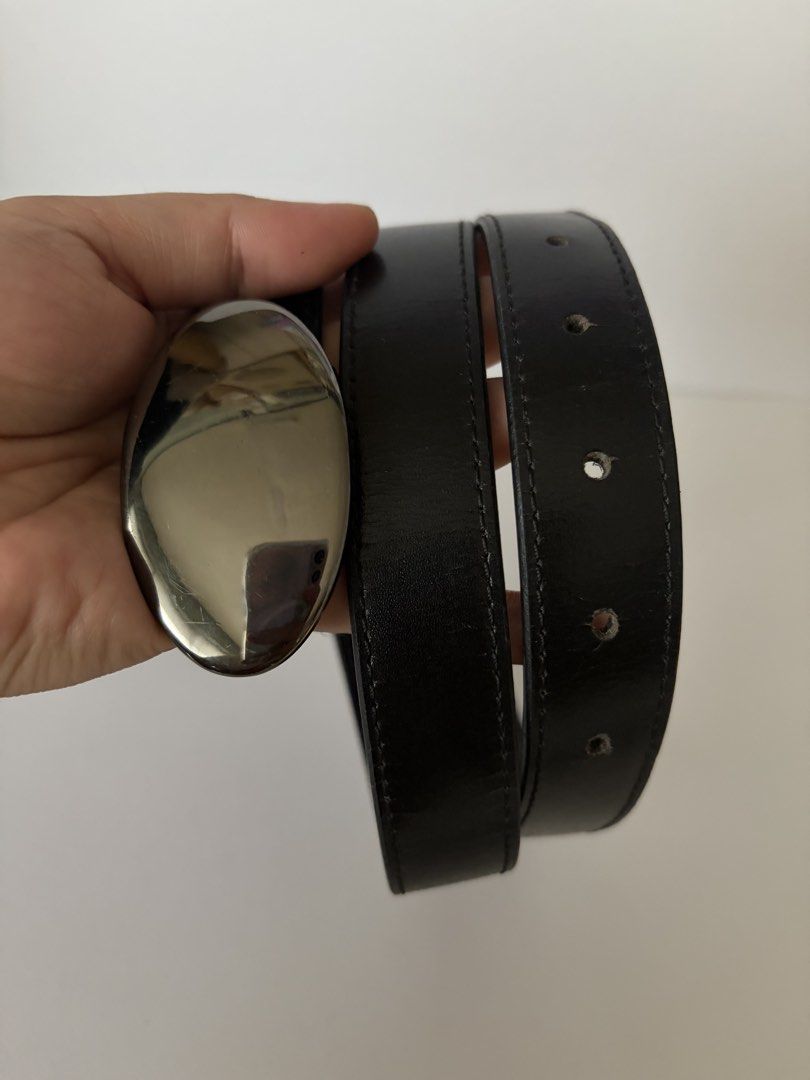 5. Black Leather Belt 36 (Category: Belts) located in Quezon City. Submitted by wagwagan_ukay_blues (Listing ID 1466028349, Image 3). Description: From Japan In good used condition Please expect signs of usage hole Size -32”-36” Overall -40” Width -1” Novaliches Qc.