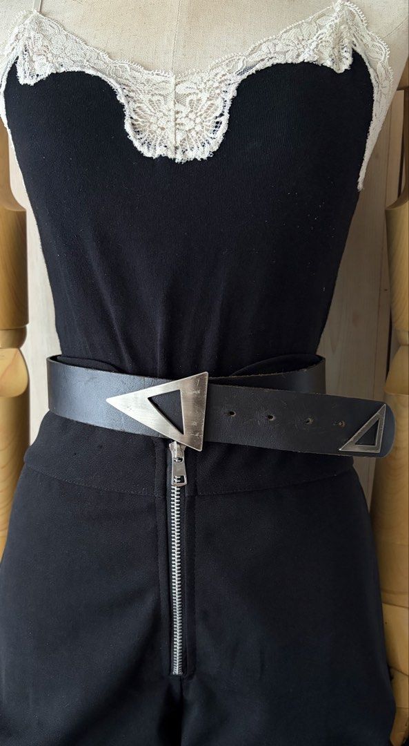 5. Triangle Buckle Black Belt (Category: Belts) located in Quezon City. Submitted by wagwagan_ukay_blues (Listing ID 1466029231, Image 1). Description: In good condition From Japan Please expect signs of usage Hole size-26”-32” Width-1.5” Overall -34” Novaliches Qc.