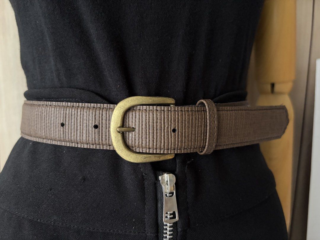 9. Brown Leather Belt 57 (Category: Belts) located in Quezon City. Submitted by wagwagan_ukay_blues (Listing ID 1466022422, Image 2). Description: From Japan In good used condition Please expect signs of usage hole Size -23”-27” Overall -30” Width -1.1” Novaliches Qc.