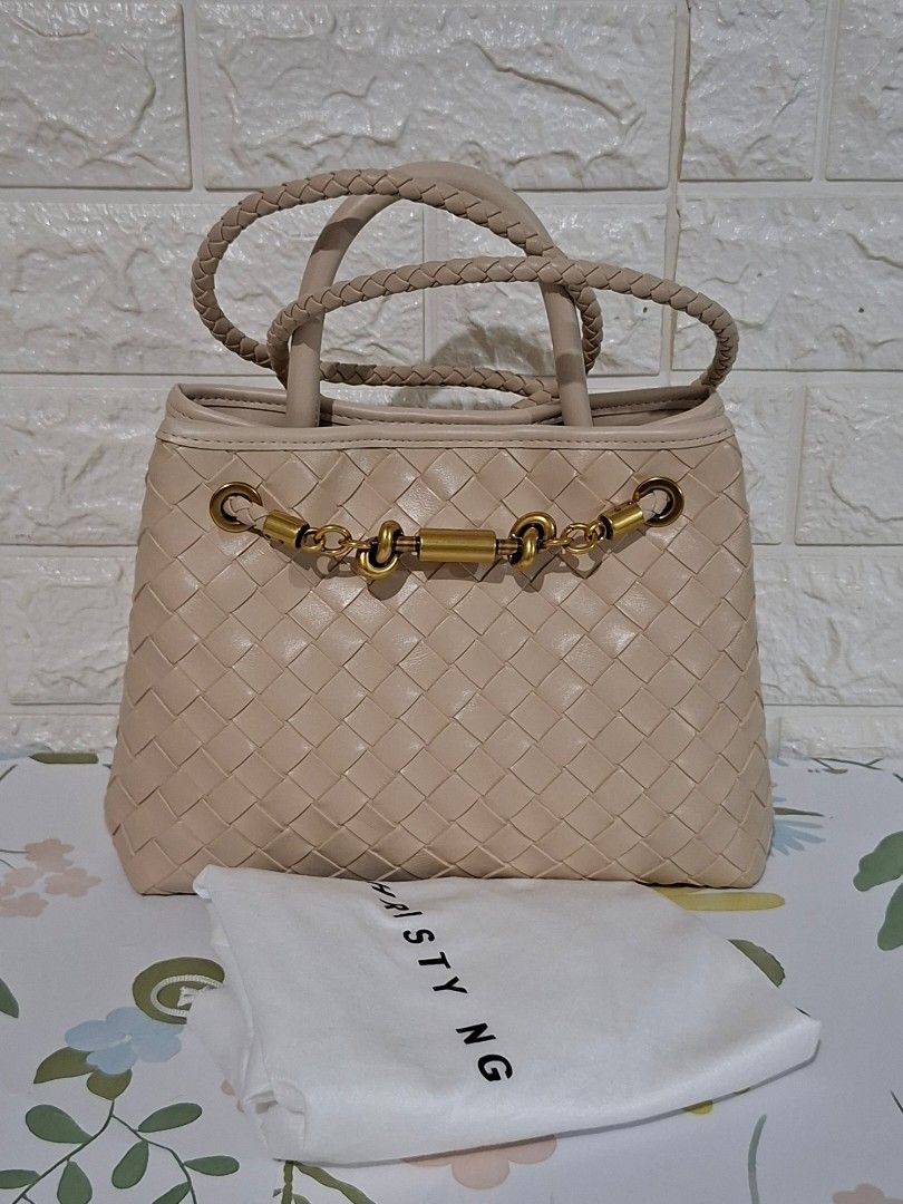 👜✨ Christy Ng Woven Bag (Category: Cross-body Bags) located in Taguig. Submitted by authprelovedonlineshop2 (Listing ID 1466011032, Image 1). Description: ### 👜✨ Christy Ng Woven Bag **Like New! Used only once! 😍** - **Christy Ng Woven Bag** - Made of **vegan leather** - Lightweight and easy to carry - 🇹🇭 **Bought at a mall in Thailand** - **Used only once for an event** - **Like-new condition** - Comes with **dust bag & original box** - 😍 