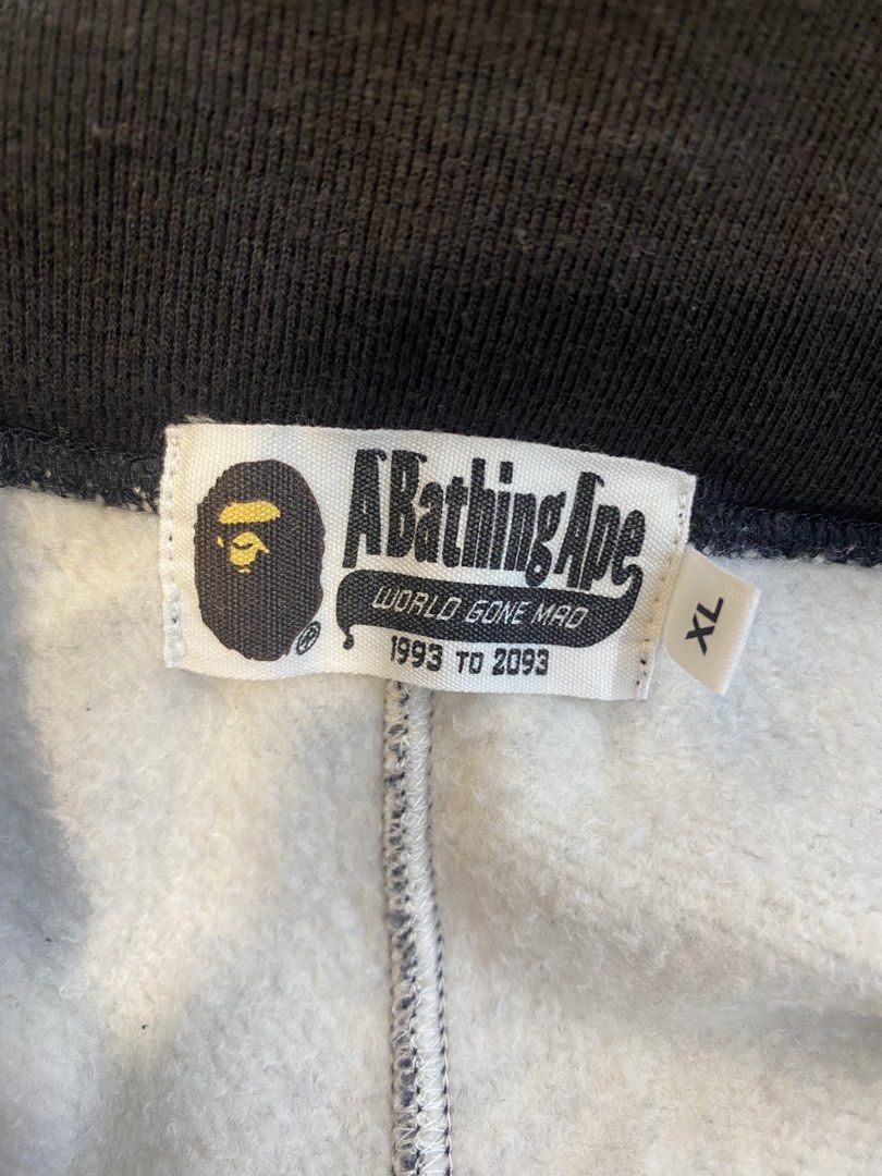 A Bathing Ape BAPE Black Graphic Sweatpants (Category: Joggers) located in Calapan. Submitted by metriowendell22 (Listing ID 1465969971, Image 3). Description: BAPE Black Graphic Sweatpants XL Made in Japan Material: Cotton blend with cozy fleece lining inside - Features: Elastic waistband with adjustable drawstring, single back pocket - Style: Classic streetwear staple.