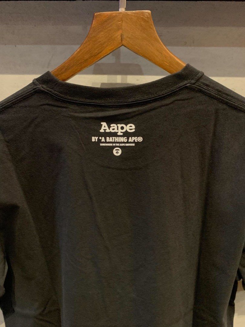 AAPE by A Bathing Ape graphic T-shirt (Category: Tshirts & Polo Shirts ) located in Imus. Submitted by vdc.apparel (Listing ID 1466155336, Image 2). Description: AAPE by A Bathing Ape graphic T-shirt •colorful geometric camo ape head logo on the chest. .