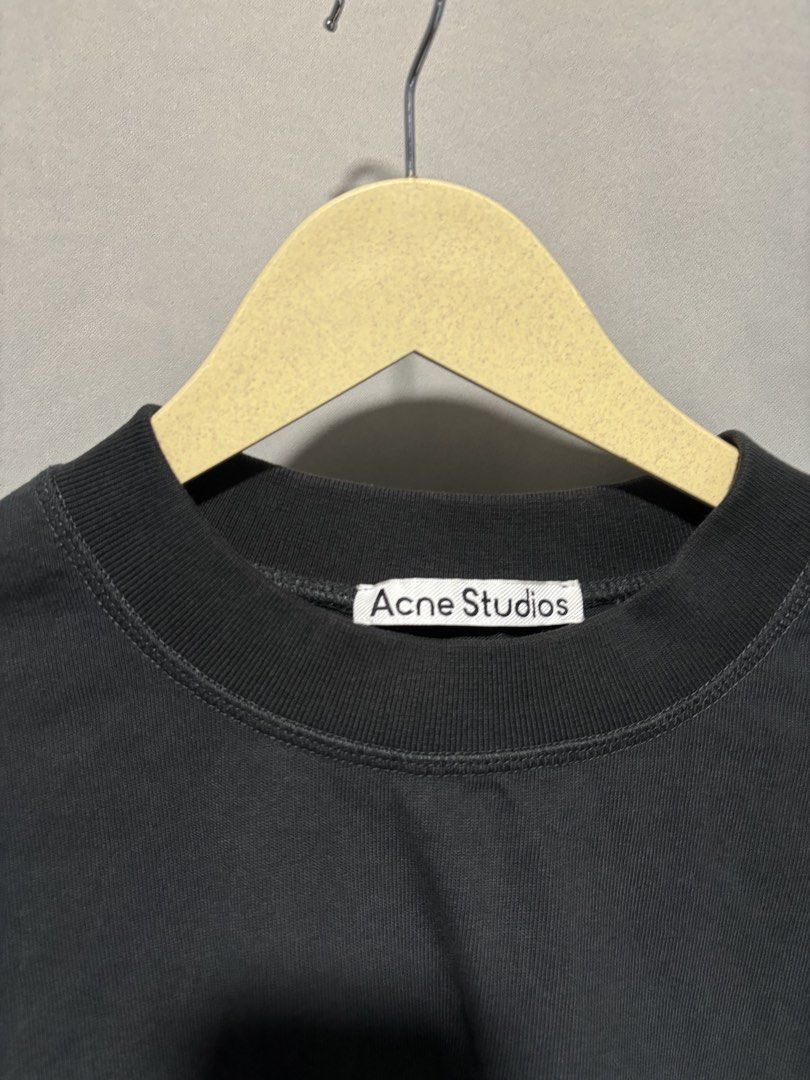 Acne Studios Black Logo Shirt (Category: Tshirts & Polo Shirts ) located in Santa Rosa. Submitted by sheabuys (Listing ID 1465961321, Image 2). Description: - Brand: Acne Studios - Color: Black with white logo text on the front - Size: Medium (M) - Fit: Relaxed fit, crewneck with a thick ribbed collar - Material: 100% heavy cotton, Made in Portugal - Details: Style code FN-MN-TSHI000245 on care label - Condition: 100% authentic and well-maintaine