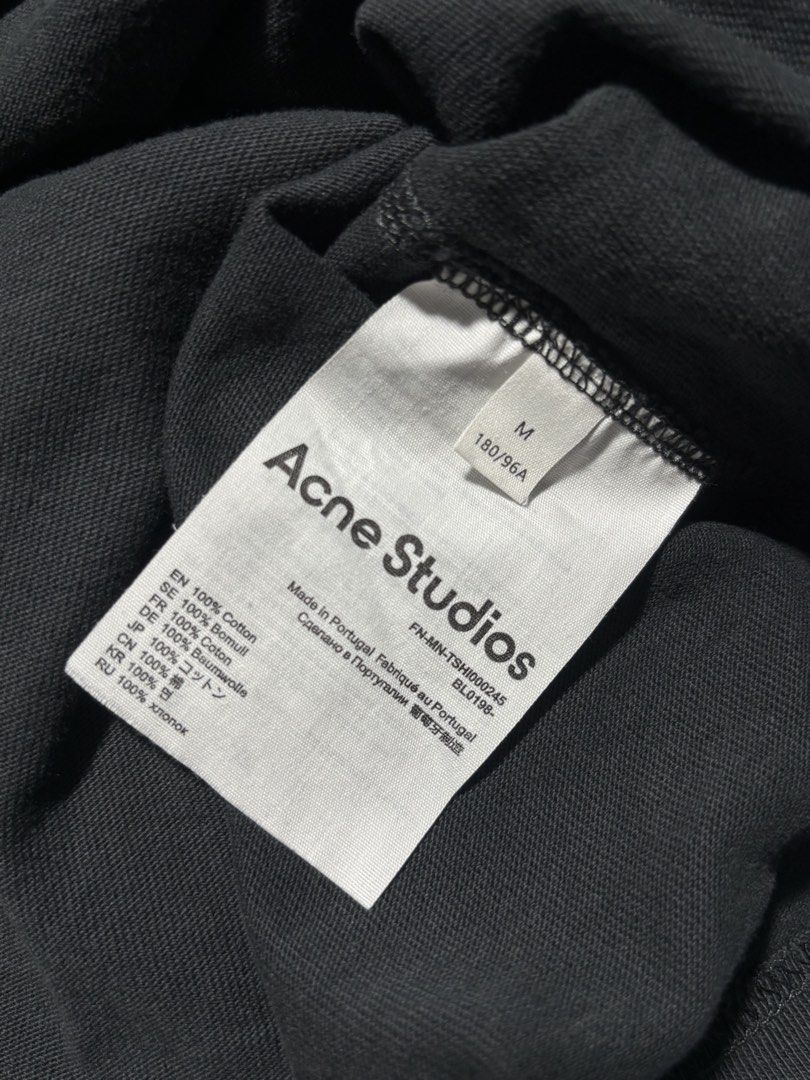 Acne Studios Black Logo Shirt (Category: Tshirts & Polo Shirts ) located in Santa Rosa. Submitted by sheabuys (Listing ID 1465961321, Image 3). Description: - Brand: Acne Studios - Color: Black with white logo text on the front - Size: Medium (M) - Fit: Relaxed fit, crewneck with a thick ribbed collar - Material: 100% heavy cotton, Made in Portugal - Details: Style code FN-MN-TSHI000245 on care label - Condition: 100% authentic and well-maintaine
