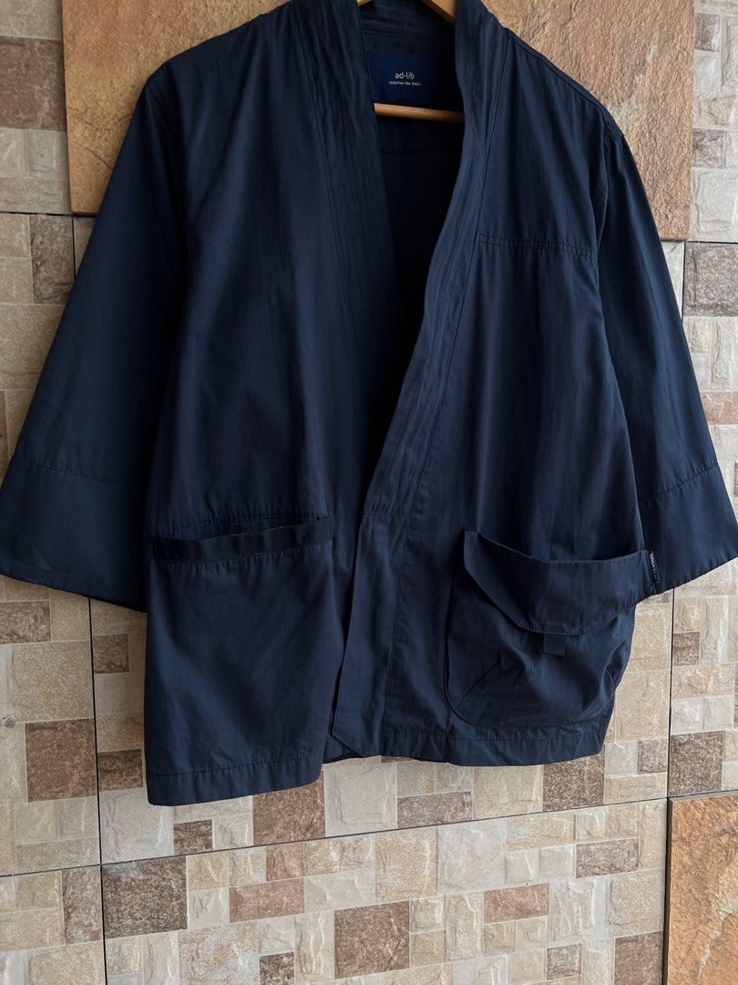 AD LIB - KIMONO JACKET (Category: Coats, Jackets and Outerwear) located in Bacolod City. Submitted by timelessbyjosh (Listing ID 1466025251, Image 2). Description: BEST FOR AMEKAJI & JAPANESE OUTFITS SIZE : SMALL ACTUAL COLOR : NAVY BLUE COLOR RATE : 9 OUT OF 10 CONDITION : EXCELLENT MATERIAL : 57 % POLYESTER , 33 % COTTON & 10 % NYLON ( MAIN FABRIC ) & 100 % COTTON ( TRIM ) MADE IN : CHINA FLAWS : NONE DIMENSIONS LENGTH - 26. 5 WIDTH ( ARMPIT TO