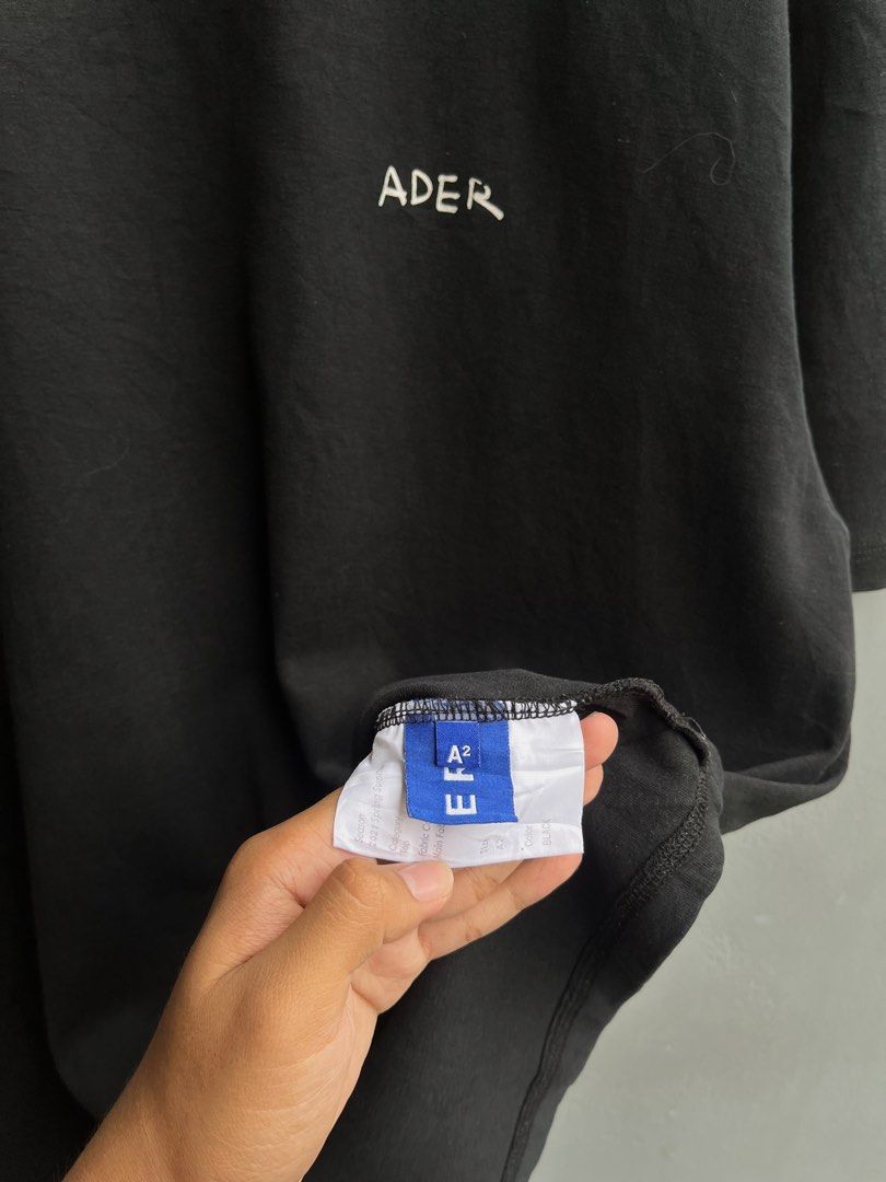 Ader Error Handwriting Logo T-Shirt (Category: Tshirts & Polo Shirts ) located in Balamban. Submitted by just_findss (Listing ID 1466045225, Image 3). Description: Ader Error Handwriting Logo T-Shirt Excellent Condition A2 on tag Dimes 22W / 29L Color Rate 9.5/10 NO ISSUE.