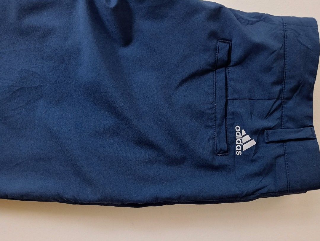 Adidas Active Shorts (Category: Shorts) located in Rizal. Submitted by timeless_shop (Listing ID 1466003658, Image 3). Description: ORIGINAL ADIDAS Golf Shorts - Navy Blue 📏 SIZE & FIT: - Size on Tag: 32" -Width 16 inches flat laid - Size Fit 32-33 Waistline - Length: 22 inches Above knee / Golf Shorts cut 🏷️ Details: - Color: Navy Blue - Style: Golf Shorts / Chino Shorts - Design: Side pockets, Back welt pockets, - With Inner Silicon Grip Wais