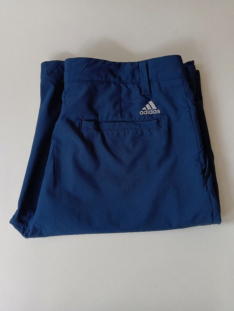 Adidas Active Shorts (Category: Shorts) located in Rizal. Submitted by timeless_shop (Listing ID 1466003658, Image 1). Description: ORIGINAL ADIDAS Golf Shorts - Navy Blue 📏 SIZE & FIT: - Size on Tag: 32" -Width 16 inches flat laid - Size Fit 32-33 Waistline - Length: 22 inches Above knee / Golf Shorts cut 🏷️ Details: - Color: Navy Blue - Style: Golf Shorts / Chino Shorts - Design: Side pockets, Back welt pockets, - With Inner Silicon Grip Wais