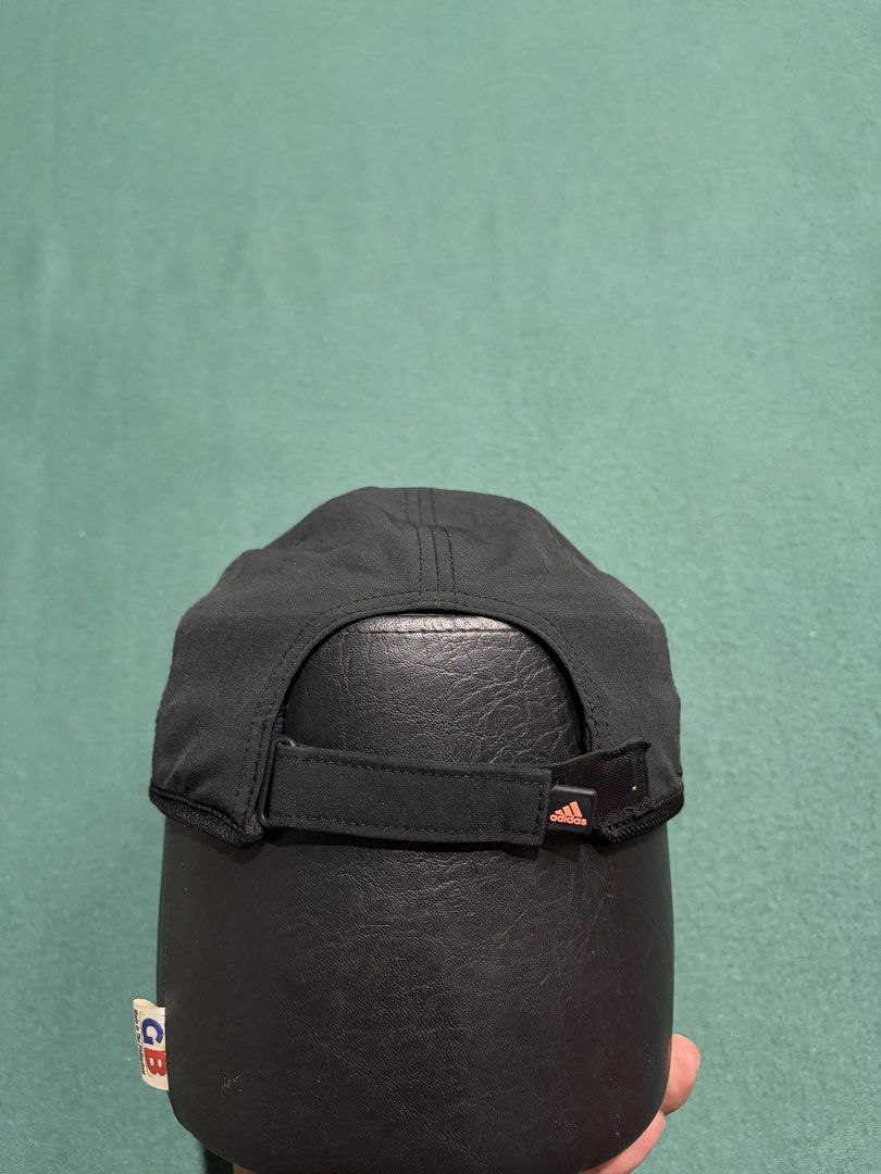 Adidas Aeroready Running Cap Black Pink Gradient (Category: Caps & Hats) located in Guihulngan. Submitted by fbthriftgoodsniace (Listing ID 1466005562, Image 3). Description: - Brand: Adidas - Color: Black with gradient pink and white logo - Tech: AEROREADY (sweat-wicking and quick-dry) - Fit: Adjustable strap with small Adidas branding tag - Condition: Excellent, clean inside and out - Ideal for: Running, workouts, and outdoor activities.