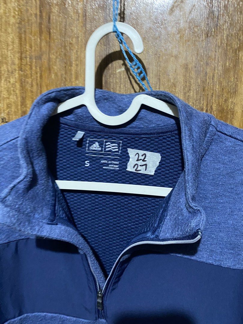 Adidas Blue Quarter Zip Pullover Sweatshirt Size S (Category: Coats, Jackets and Outerwear) located in Imus. Submitted by frootiloots4103 (Listing ID 1466036139, Image 3). Description: - Brand: Adidas - Style: Quarter zip pullover with stand-up collar - Size: Small 22x27 - Color/Design: Blue with contrast dark blue chest panel and silver Adidas logo on left sleeve - Comfort: Textured inner lining for extra warmth and coziness - Origin: Made in Ch