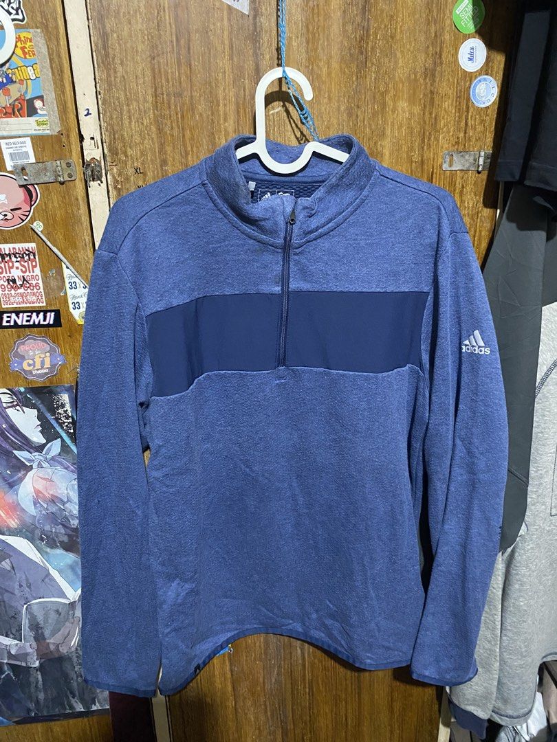 Adidas Blue Quarter Zip Pullover Sweatshirt Size S (Category: Coats, Jackets and Outerwear) located in Imus. Submitted by frootiloots4103 (Listing ID 1466036139, Image 1). Description: - Brand: Adidas - Style: Quarter zip pullover with stand-up collar - Size: Small 22x27 - Color/Design: Blue with contrast dark blue chest panel and silver Adidas logo on left sleeve - Comfort: Textured inner lining for extra warmth and coziness - Origin: Made in Ch