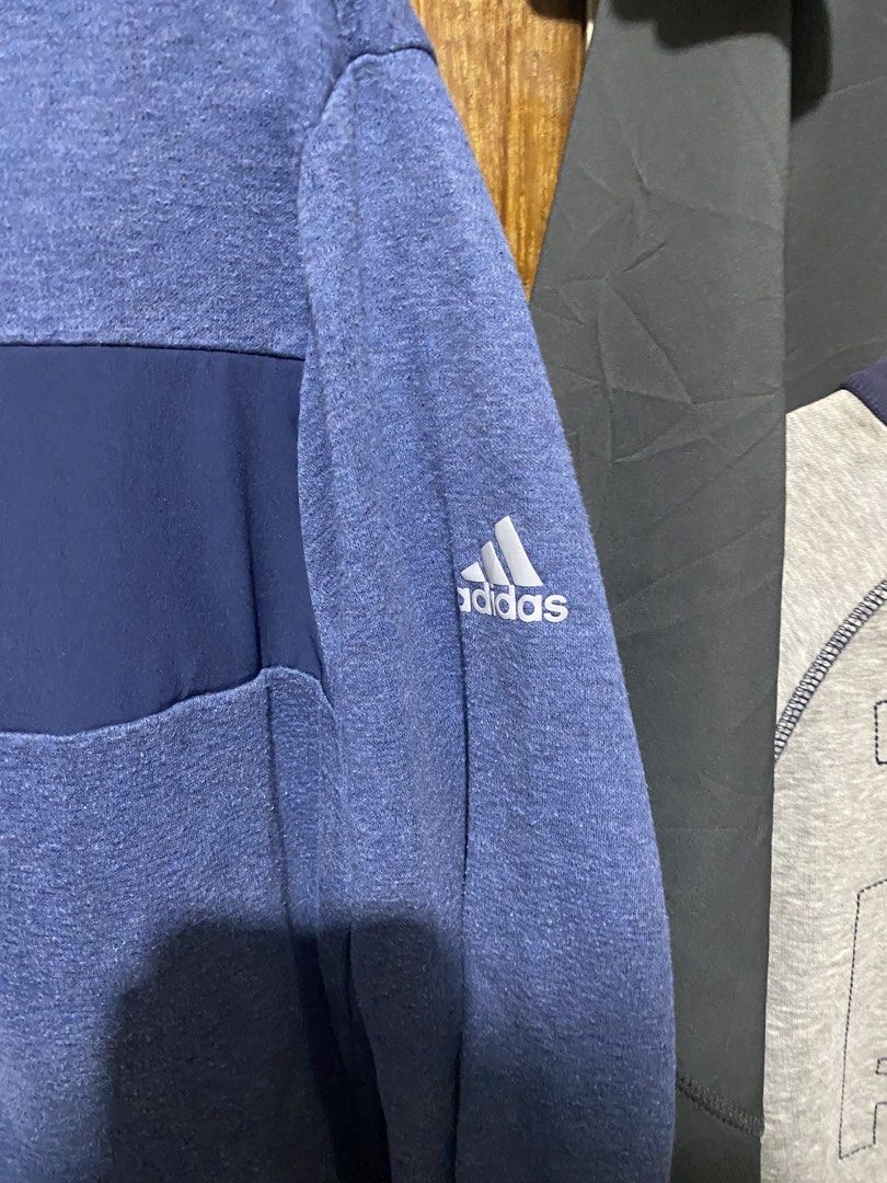 Adidas Blue Quarter Zip Pullover Sweatshirt Size S (Category: Coats, Jackets and Outerwear) located in Imus. Submitted by frootiloots4103 (Listing ID 1466036139, Image 2). Description: - Brand: Adidas - Style: Quarter zip pullover with stand-up collar - Size: Small 22x27 - Color/Design: Blue with contrast dark blue chest panel and silver Adidas logo on left sleeve - Comfort: Textured inner lining for extra warmth and coziness - Origin: Made in Ch