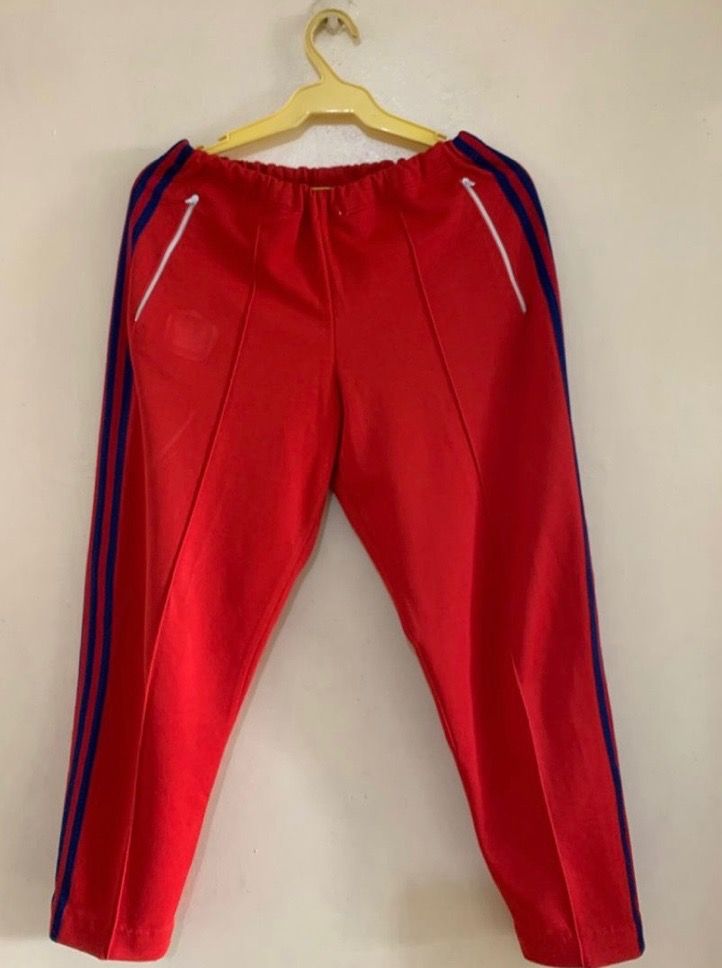Adidas Jogger Unisex (Category: Other Bottoms) located in Valenzuela. Submitted by clickandshoppreloved (Listing ID 1466011123, Image 1). Description: Adidas Jogger Unisex Onhand, (Large ontag overuns) Waist : 27in Height: 34 Color : Red (Excellent Condition, Good As New).