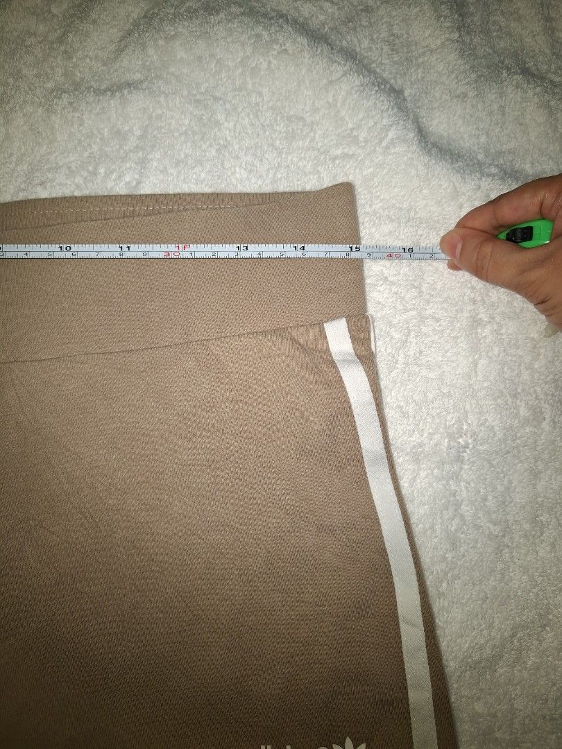 ADIDAS KHAKI KNEE LEVEL SHORT - L (Category: Shorts) located in Abucay. Submitted by petiteprettyboutiquev2 (Listing ID 1466076765, Image 2). Description: min.stains see last 2 photos + SF (J&T).