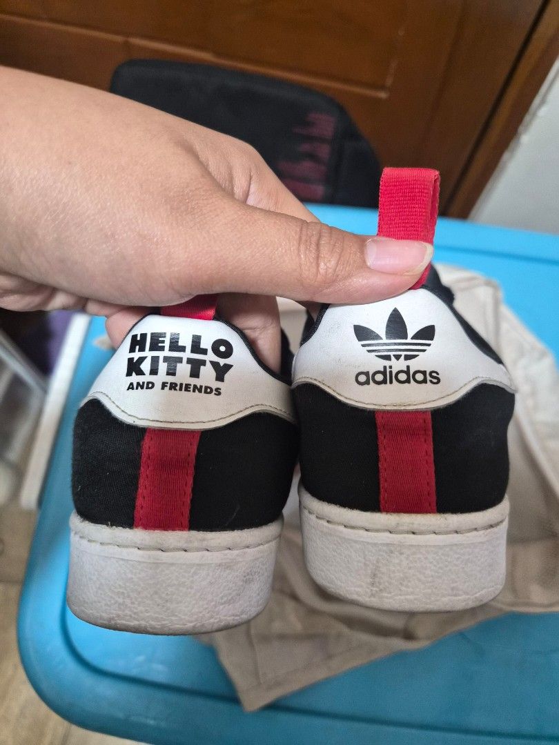 Adidas Sanrio Shoes (Category: Sneakers) located in Quezon. Submitted by imdonelle (Listing ID 1466088919, Image 3). Description: ✨ Details: • Authentic / Original Adidas • Hello Kitty design with black, white & pink/red accents • Preloved condition • With visible signs of use, particularly on the white shell/toe area and soles • Please see all photos for the actual condition 👟 Size: US 3, UK2 1/2 , CHN 210 Selling because she has already outgro