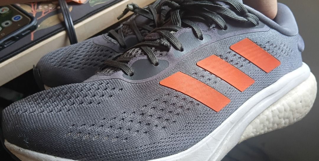 Adidas Supernova 2 Running Shoes (Category: Casual Shoes) located in Makati City. Submitted by brightearth_160a1a (Listing ID 1466027146, Image 3). Description: This is a three year old running shoes with obvious signs of usage especially on the soles. Pati yung tip ng upper sole niya sa toes medyo natatanggal na rin but regluing will fix it. Cleaning this will make it more presentable. The shoes has plenty of remaining mileage as this was not my