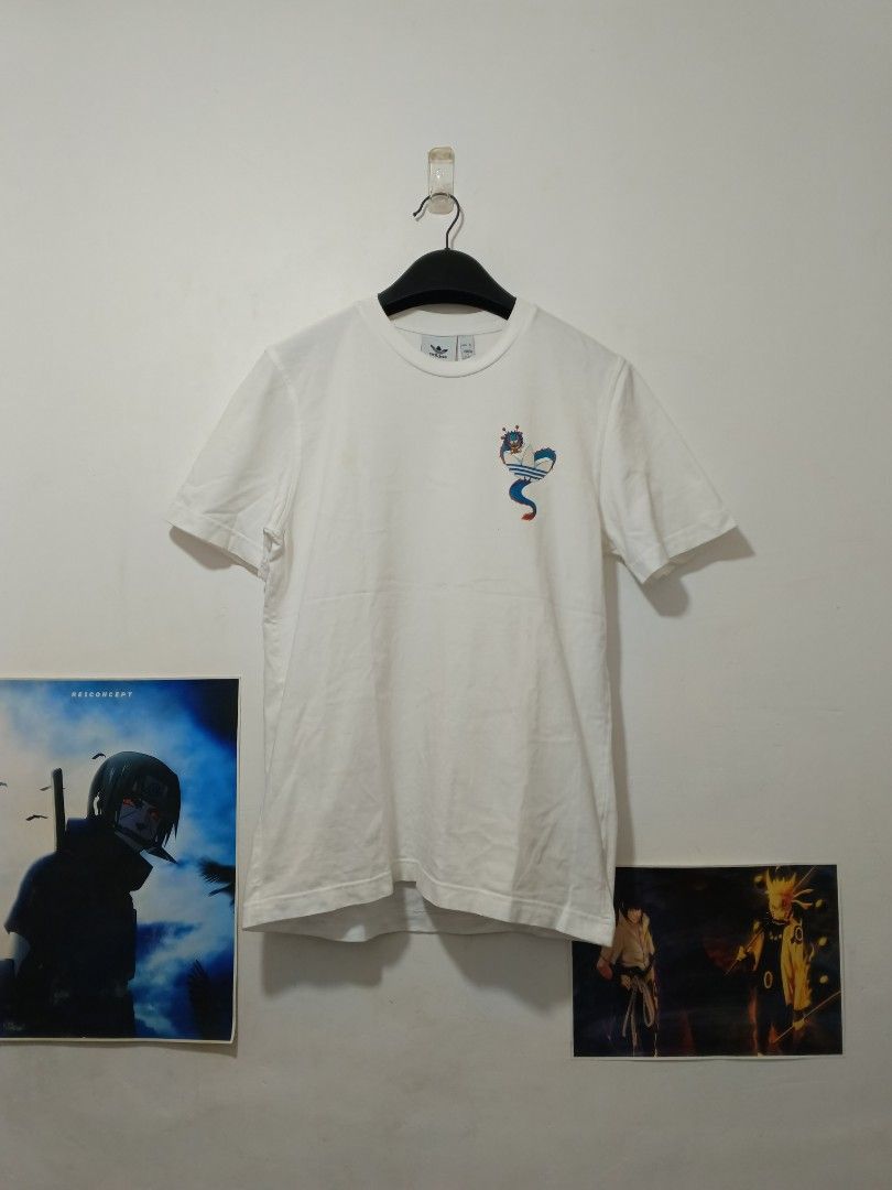 Adidas Tee (Category: Tshirts & Polo Shirts ) located in Cebu City. Submitted by authenticgrids (Listing ID 1466081109, Image 1). Description: Adi Das Graphic Printed Tee Excellent/ Like New Condition ✨ Size on Tag Small 🏷️ Best Fit Small- Medium Dimensions Width 19 inches Length 27 inches DM us for more details 📥📥📥📥📥📥📥.