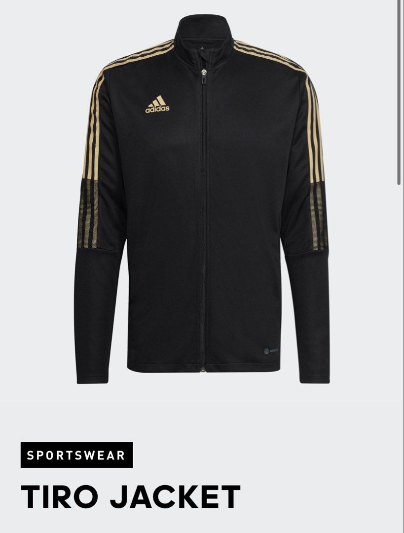 Adidas Tiro Jacket Black Gold (Category: Coats, Jackets and Outerwear) located in Manila. Submitted by uuwoooogghreiri (Listing ID 1466039529, Image 1). Description: - Brand: Adidas Tiro - Color: Black with gold details - Design: Full zip closure, stand-up collar, and classic three stripes on sleeves - Features: Ribbed mesh paneling on upper arms for breathability - Fit: Standard fit, lightweight material - Best for: Workouts, training sessions, 