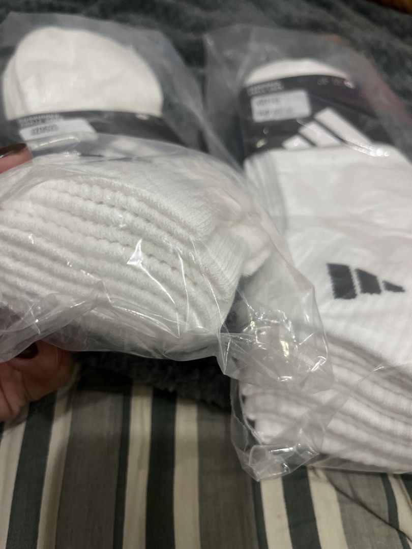 Repriced! Adidas White Ankle Socks 3-Pack (Category: Socks) located in Cebu City. Submitted by iamgee89 (Listing ID 1465968363, Image 2). Description: - Authentic pack of 3 white Adidas ankle socks - Size large - Classic athletic style with comfortable ribbed cuffs - Features stylish grey logo branding near the top - Soft and breathable cotton blend for daily workouts or casual wear - Standard sizing available (refer to the size chart photo).