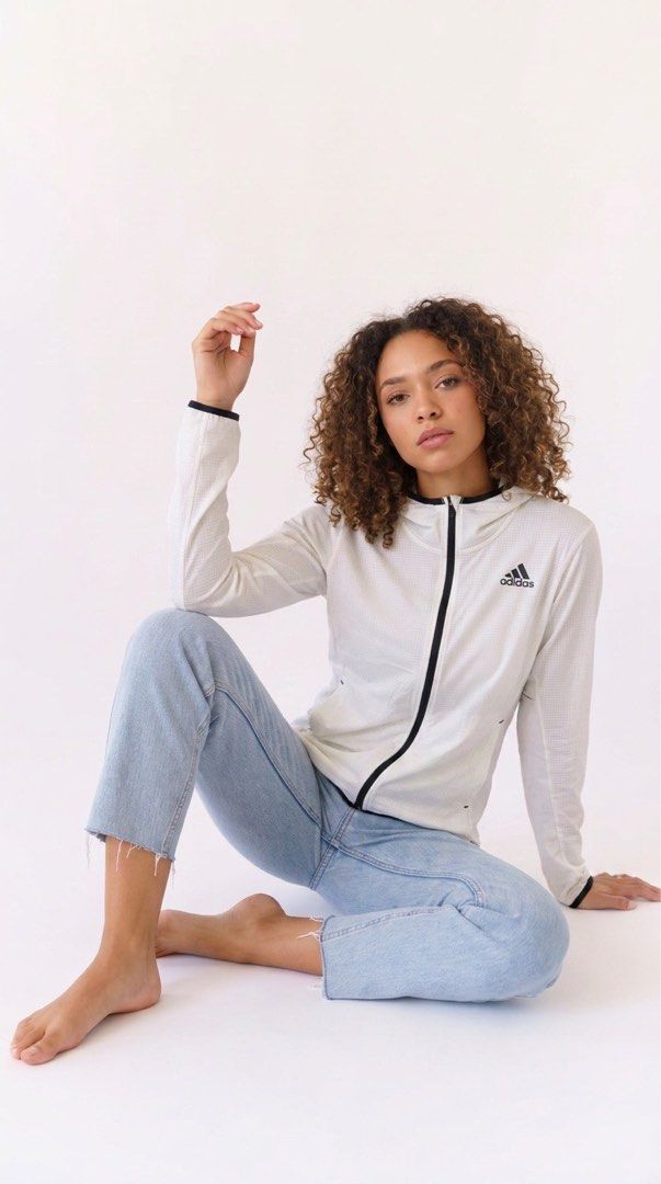 Adidas White Grid Pattern Zip-Up Hoodie (Category: Activewear) located in Quezon City. Submitted by i2ochelle227661 (Listing ID 1465988911, Image 1). Description: Original and purchased in USA - Brand: Adidas - Color: White with black accents - Design: Textured grid pattern all over - Features: Full-length black front zipper, black trim on hood and cuffs, printed black logo on left chest - Material: Lightweight and comfortable - Ideal for: Workou
