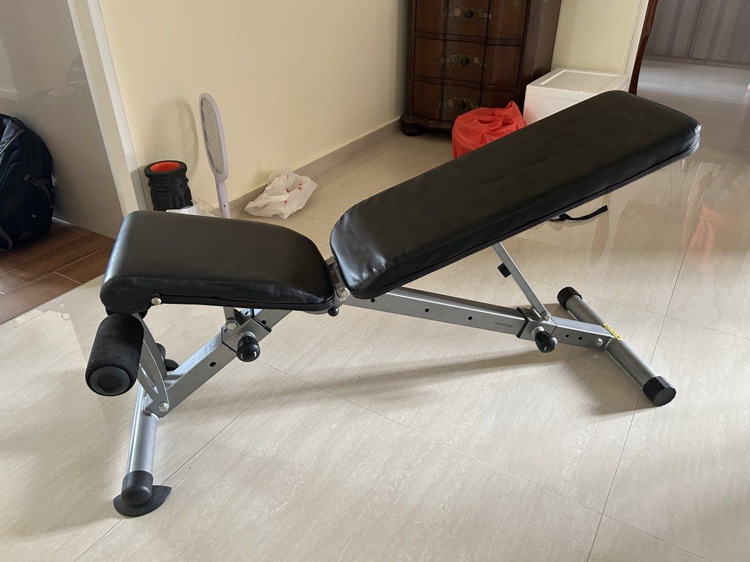 Adjustable Bench solid build (Category: Weights & Dumbbells) located in Singapore. Submitted by pasirrismonkey (Listing ID 1465999501, Image 3). Description: Adjustable workout bench. Multiple incline and flat settings. Foam leg rollers at the front for secure workouts during sit-ups and bench presses. Sturdy metal build with adjustable knobs on the support bars. Easy to fold or adjust angles for home gym routines. Self collection .