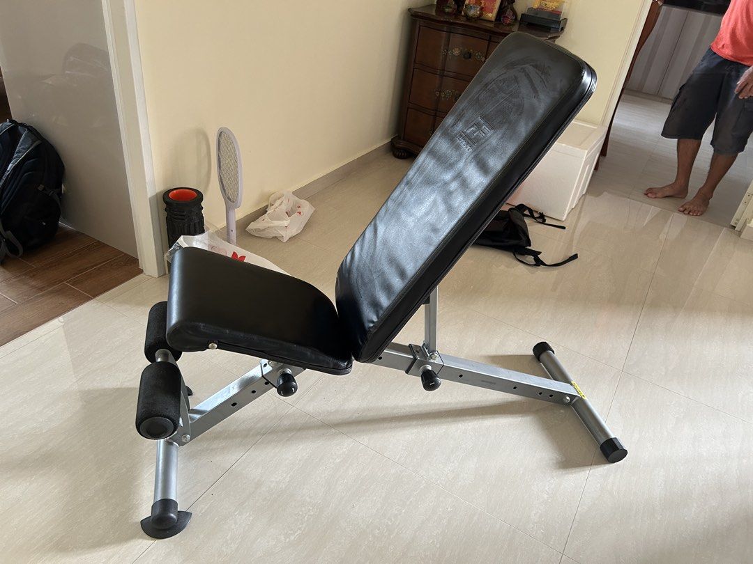 Adjustable Bench solid build (Category: Weights & Dumbbells) located in Singapore. Submitted by pasirrismonkey (Listing ID 1465999501, Image 5). Description: Adjustable workout bench. Multiple incline and flat settings. Foam leg rollers at the front for secure workouts during sit-ups and bench presses. Sturdy metal build with adjustable knobs on the support bars. Easy to fold or adjust angles for home gym routines. Self collection .