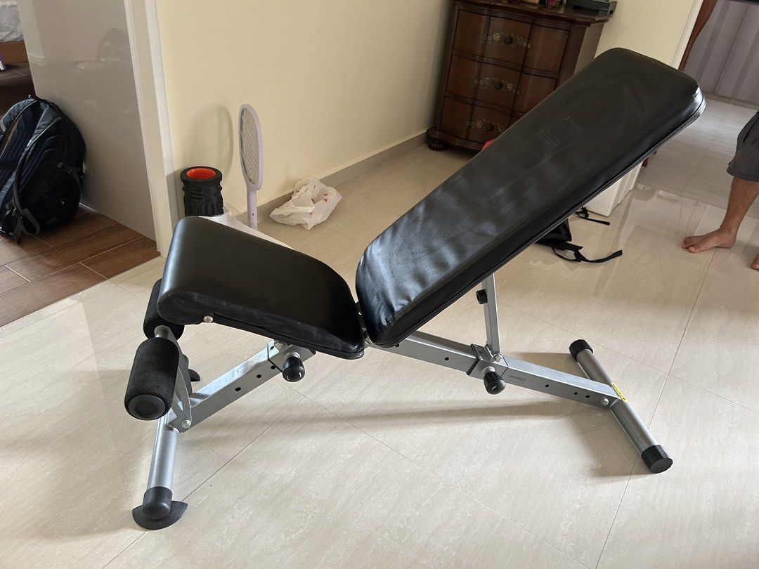 Adjustable Bench solid build (Category: Weights & Dumbbells) located in Singapore. Submitted by pasirrismonkey (Listing ID 1465999501, Image 4). Description: Adjustable workout bench. Multiple incline and flat settings. Foam leg rollers at the front for secure workouts during sit-ups and bench presses. Sturdy metal build with adjustable knobs on the support bars. Easy to fold or adjust angles for home gym routines. Self collection .