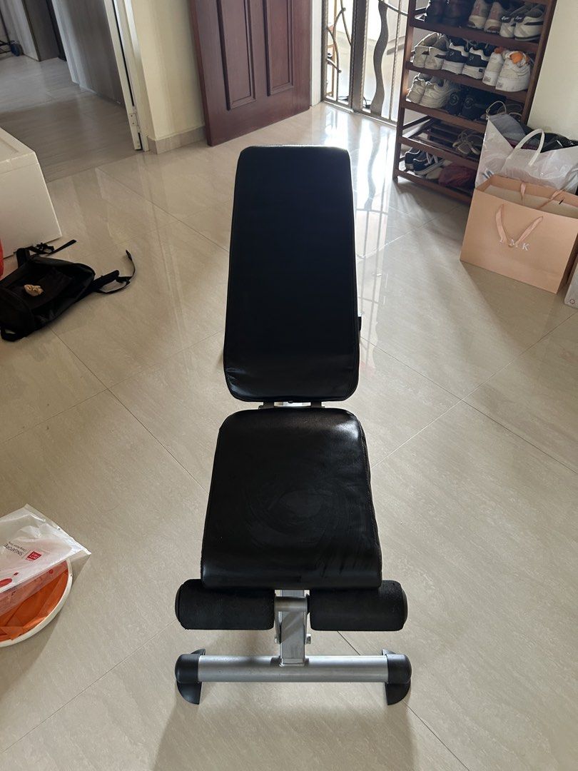 Adjustable Bench solid build (Category: Weights & Dumbbells) located in Singapore. Submitted by pasirrismonkey (Listing ID 1465999501, Image 10). Description: Adjustable workout bench. Multiple incline and flat settings. Foam leg rollers at the front for secure workouts during sit-ups and bench presses. Sturdy metal build with adjustable knobs on the support bars. Easy to fold or adjust angles for home gym routines. Self collection .